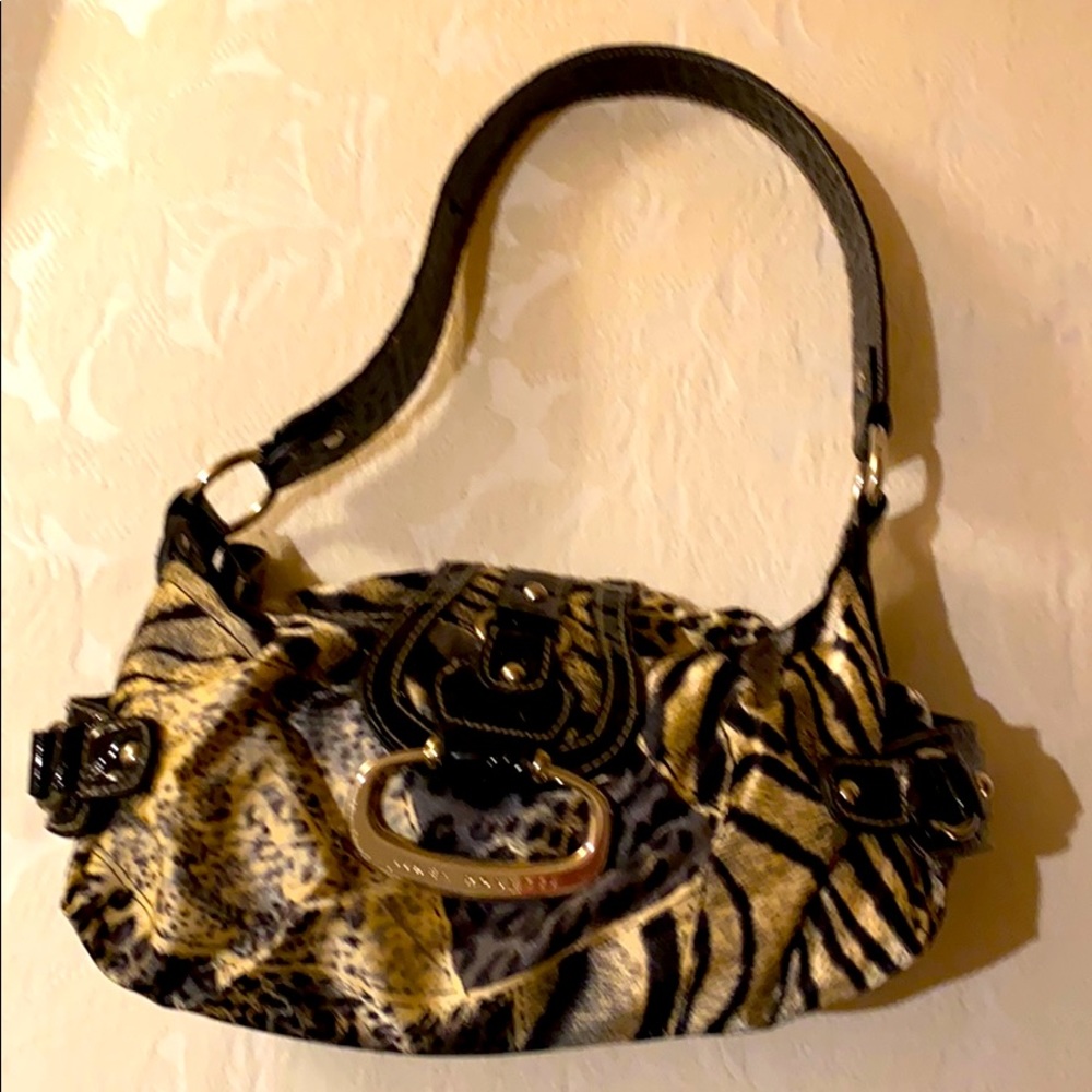 Like new Linea Rossetti wild animal print purse!!